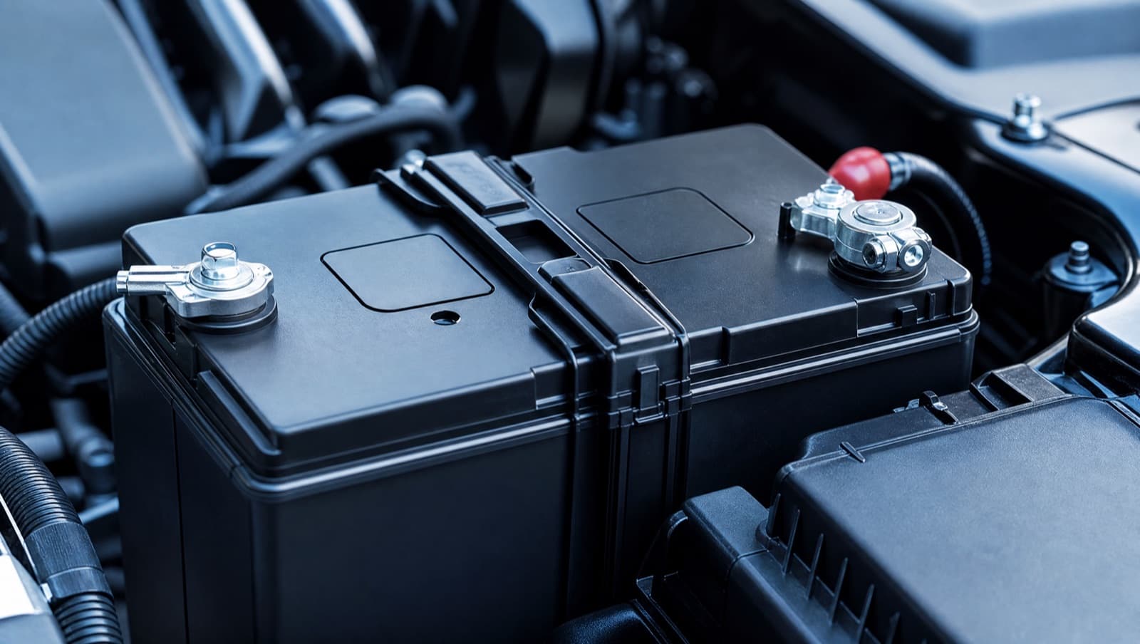 Close-up of a car battery and its terminals